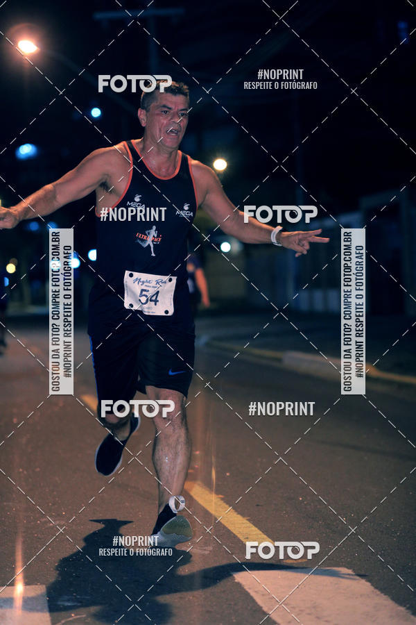 Buy your photos of the eventNight Run 5K 10K Praia Grande on Fotop