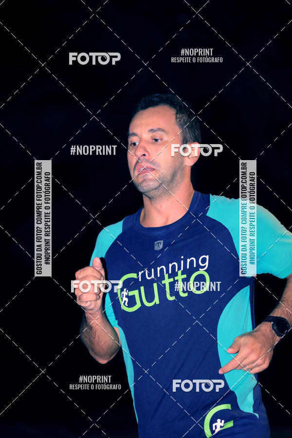 Buy your photos of the eventNight Run 5K 10K Praia Grande on Fotop