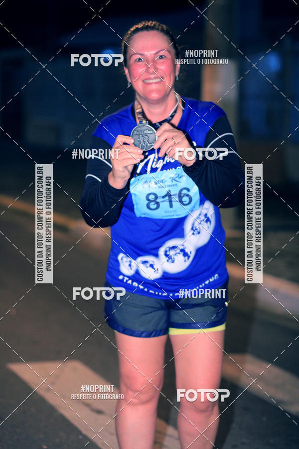 Buy your photos of the eventNight Run 5K 10K Praia Grande on Fotop