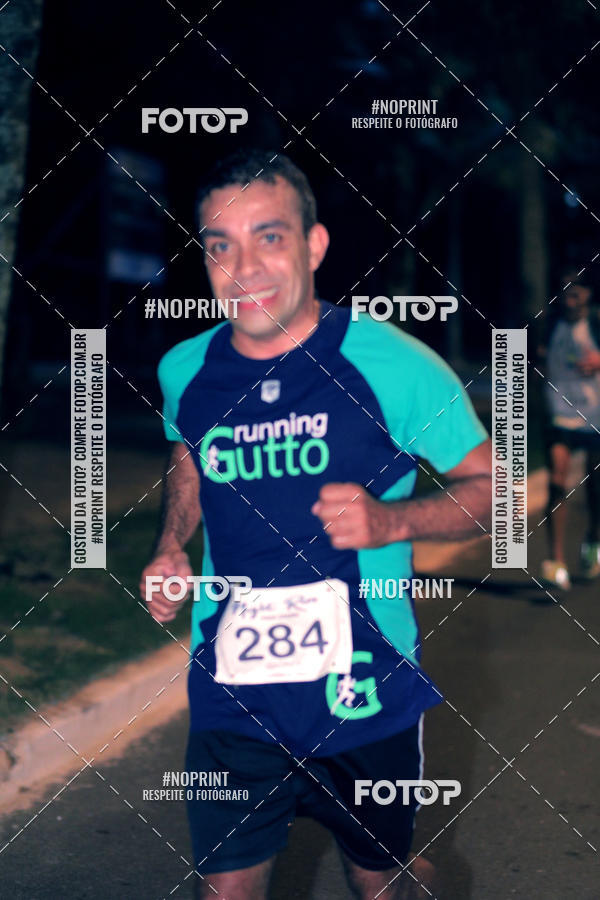 Buy your photos of the eventNight Run 5K 10K Praia Grande on Fotop