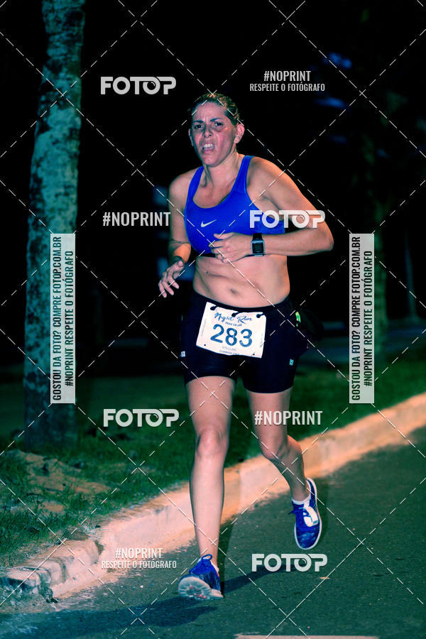 Buy your photos of the eventNight Run 5K 10K Praia Grande on Fotop