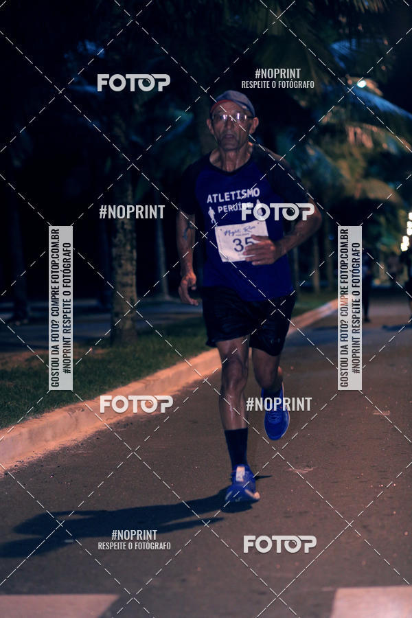 Buy your photos of the eventNight Run 5K 10K Praia Grande on Fotop
