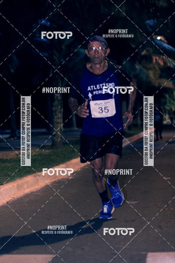 Buy your photos of the eventNight Run 5K 10K Praia Grande on Fotop
