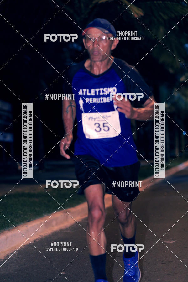 Buy your photos of the eventNight Run 5K 10K Praia Grande on Fotop