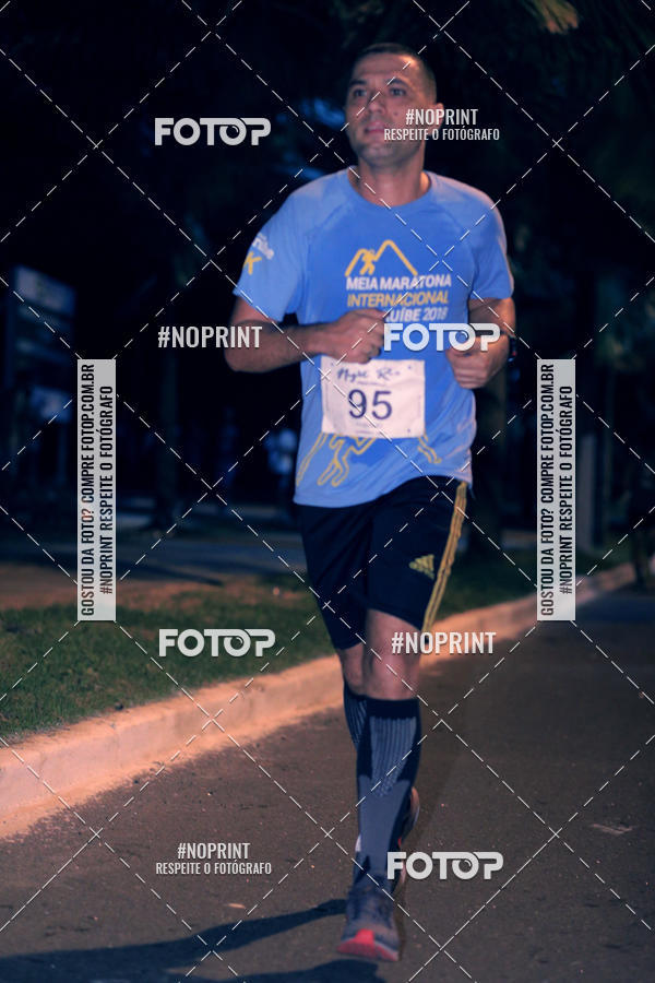 Buy your photos of the eventNight Run 5K 10K Praia Grande on Fotop