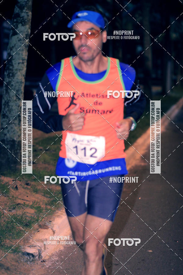 Buy your photos of the eventNight Run 5K 10K Praia Grande on Fotop