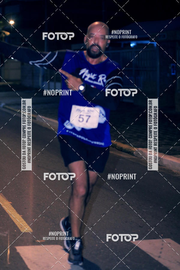 Buy your photos of the eventNight Run 5K 10K Praia Grande on Fotop