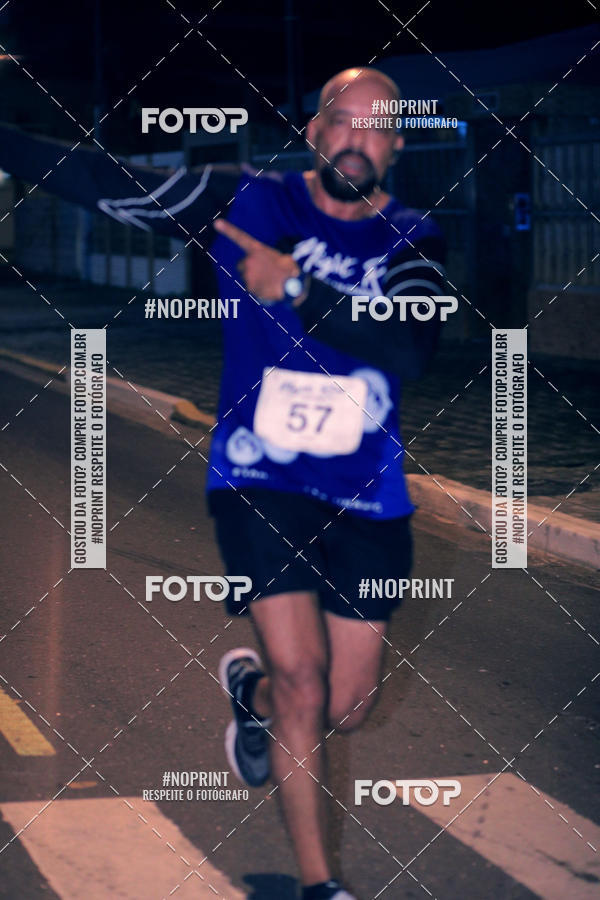 Buy your photos of the eventNight Run 5K 10K Praia Grande on Fotop