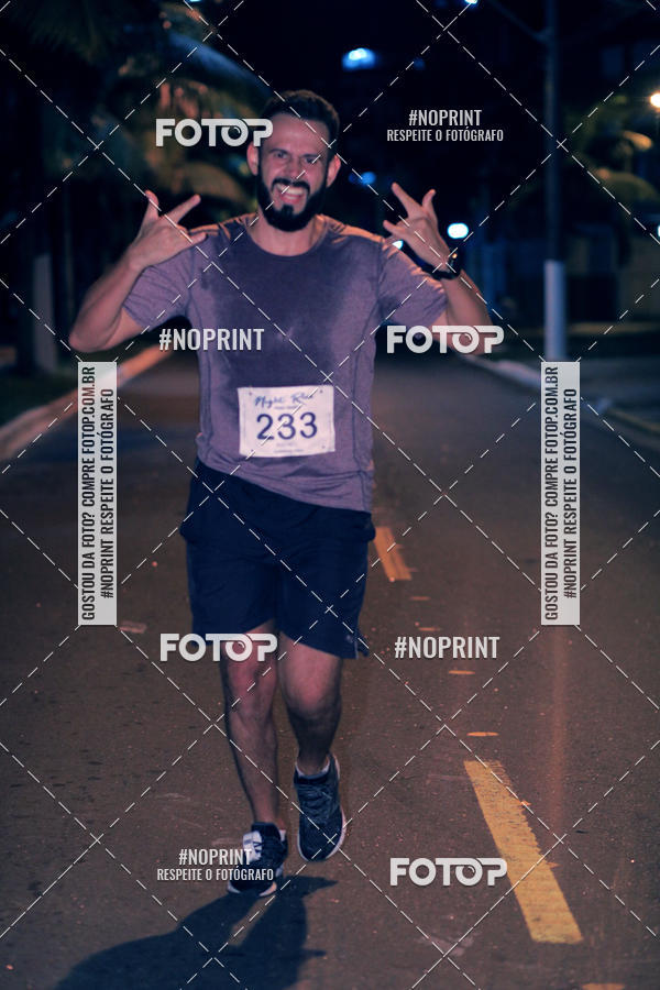 Buy your photos of the eventNight Run 5K 10K Praia Grande on Fotop