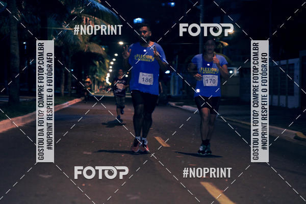 Buy your photos of the eventNight Run 5K 10K Praia Grande on Fotop
