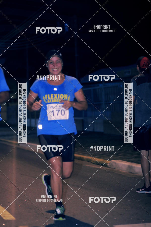 Buy your photos of the eventNight Run 5K 10K Praia Grande on Fotop