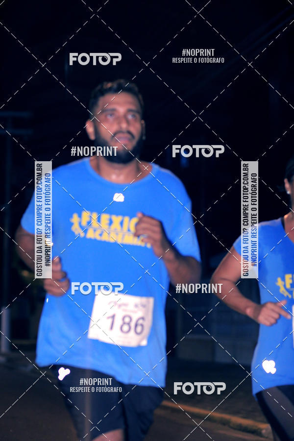 Buy your photos of the eventNight Run 5K 10K Praia Grande on Fotop