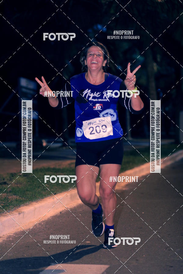Buy your photos of the eventNight Run 5K 10K Praia Grande on Fotop