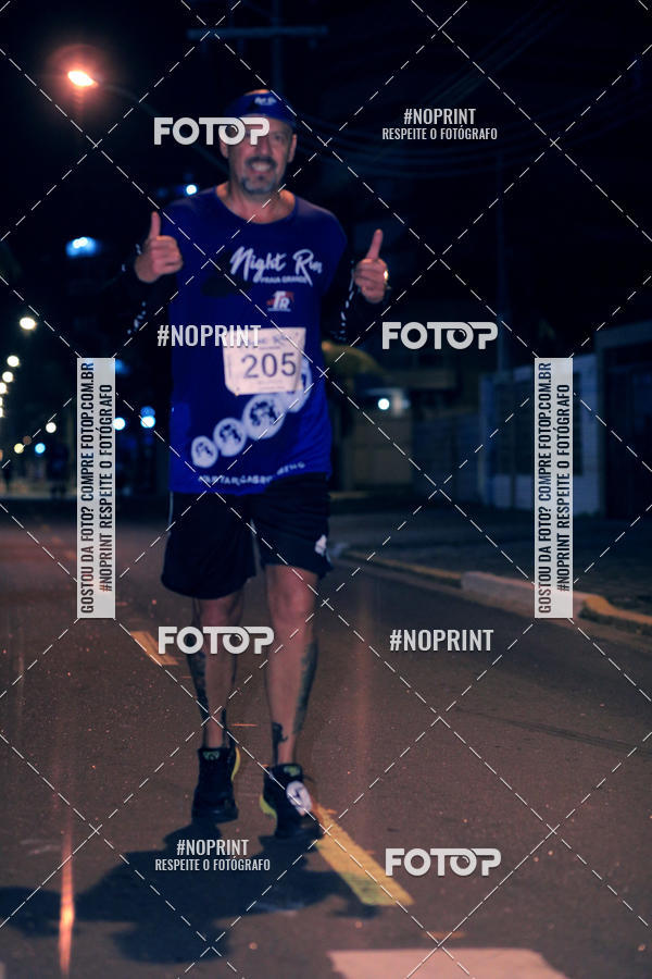 Buy your photos of the eventNight Run 5K 10K Praia Grande on Fotop