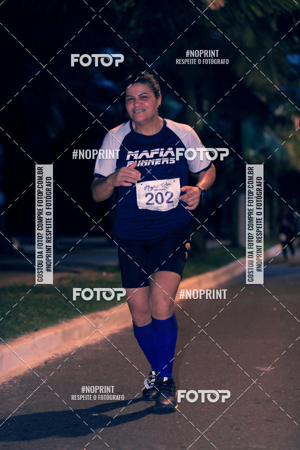 Buy your photos of the eventNight Run 5K 10K Praia Grande on Fotop