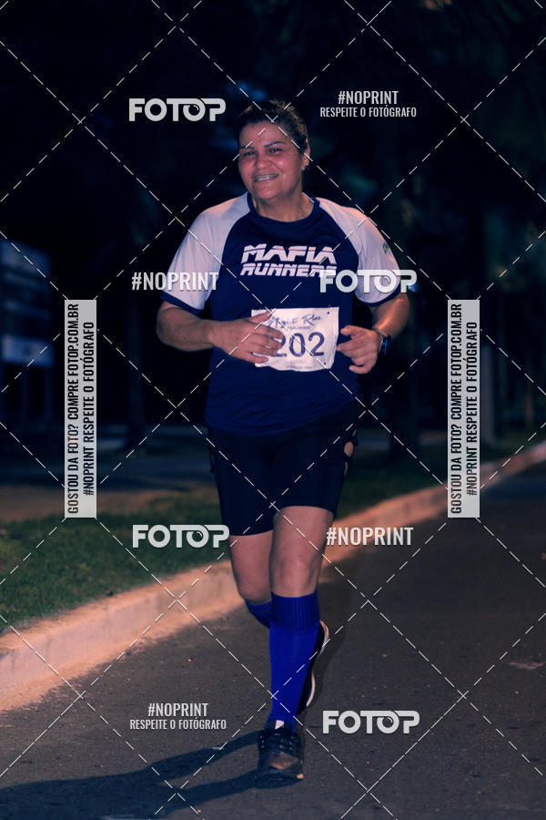 Buy your photos of the eventNight Run 5K 10K Praia Grande on Fotop