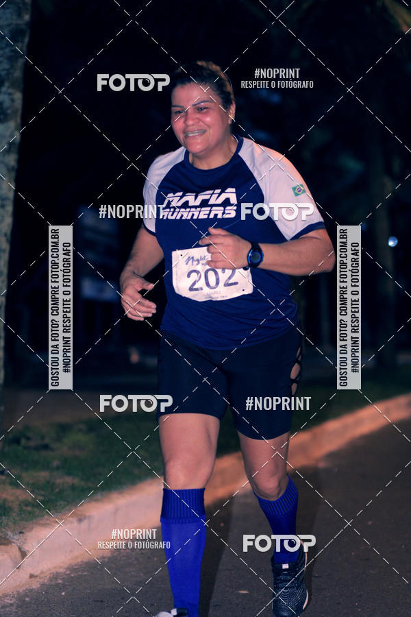 Buy your photos of the eventNight Run 5K 10K Praia Grande on Fotop