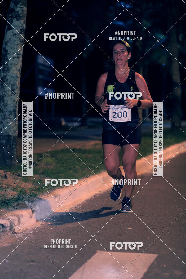 Buy your photos of the eventNight Run 5K 10K Praia Grande on Fotop