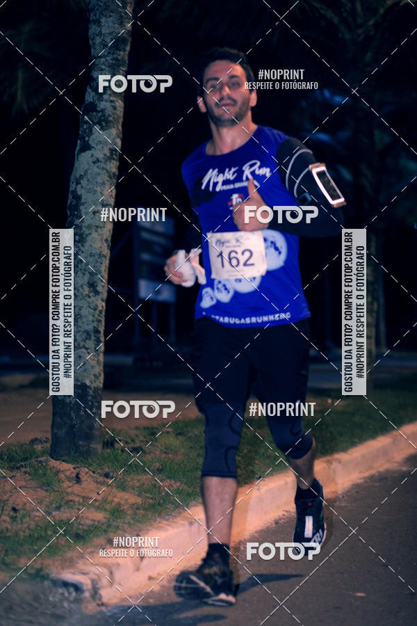 Buy your photos of the eventNight Run 5K 10K Praia Grande on Fotop