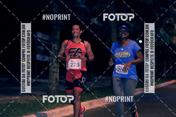 Buy your photos of the eventNight Run 5K 10K Praia Grande on Fotop