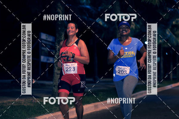 Buy your photos of the eventNight Run 5K 10K Praia Grande on Fotop