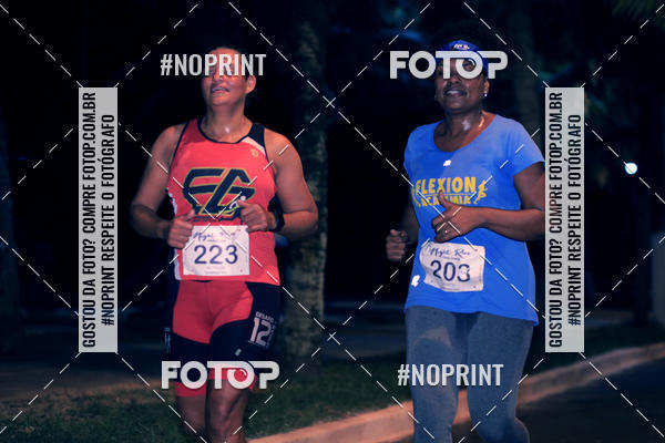 Buy your photos of the eventNight Run 5K 10K Praia Grande on Fotop