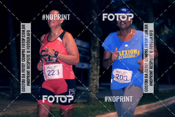 Buy your photos of the eventNight Run 5K 10K Praia Grande on Fotop