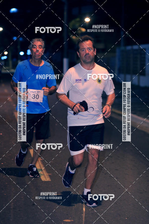 Buy your photos of the eventNight Run 5K 10K Praia Grande on Fotop