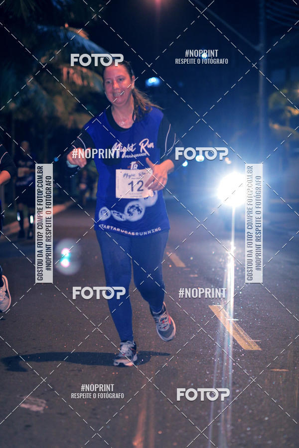 Buy your photos of the eventNight Run 5K 10K Praia Grande on Fotop
