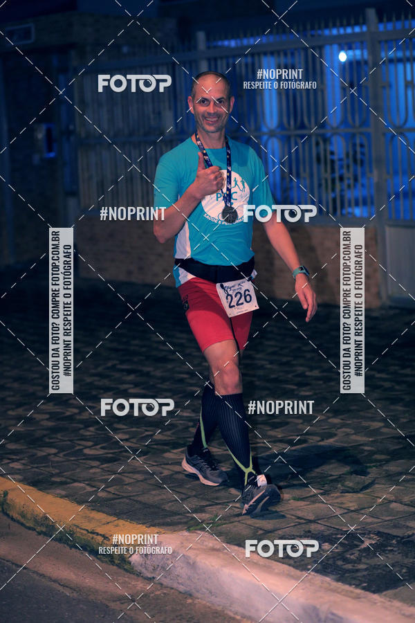 Buy your photos of the eventNight Run 5K 10K Praia Grande on Fotop