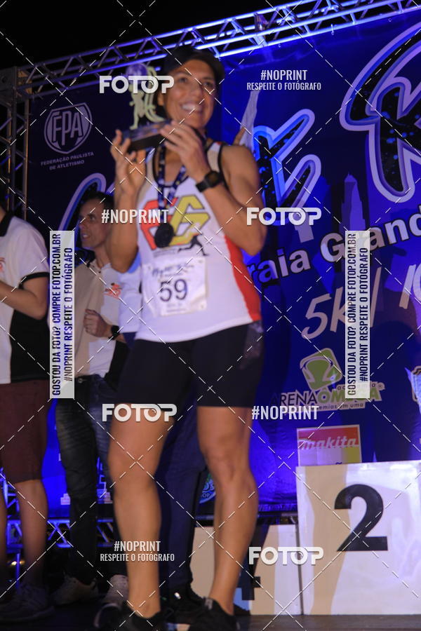 Buy your photos of the eventNight Run 5K 10K Praia Grande on Fotop