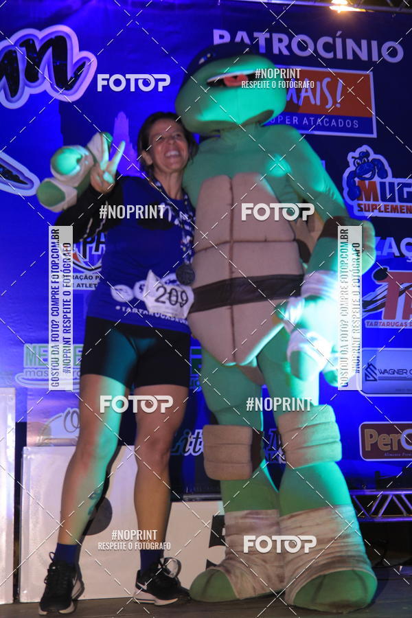 Buy your photos of the eventNight Run 5K 10K Praia Grande on Fotop