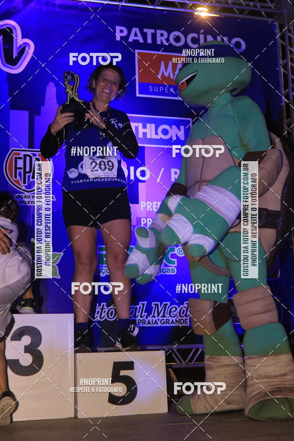 Buy your photos of the eventNight Run 5K 10K Praia Grande on Fotop