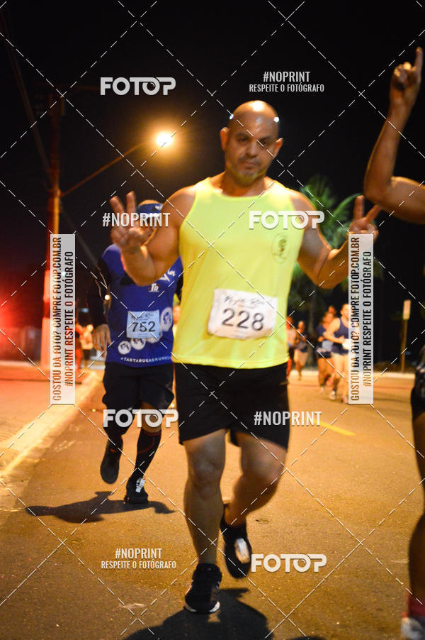 Buy your photos of the eventNight Run 5K 10K Praia Grande on Fotop