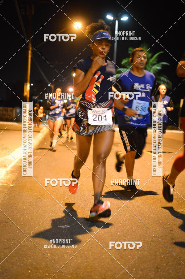 Buy your photos of the eventNight Run 5K 10K Praia Grande on Fotop