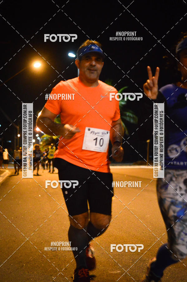 Buy your photos of the eventNight Run 5K 10K Praia Grande on Fotop