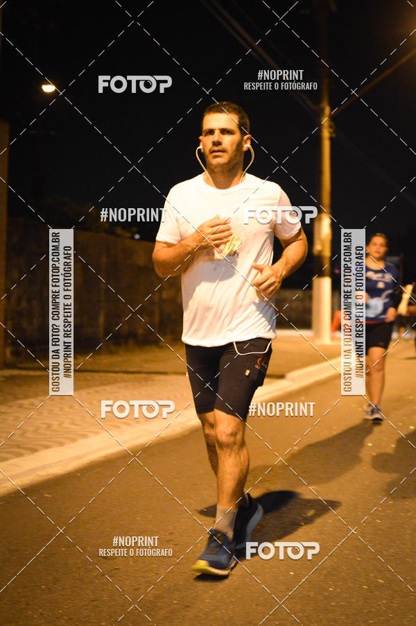 Buy your photos of the eventNight Run 5K 10K Praia Grande on Fotop