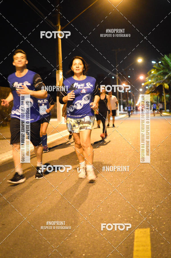 Buy your photos of the eventNight Run 5K 10K Praia Grande on Fotop