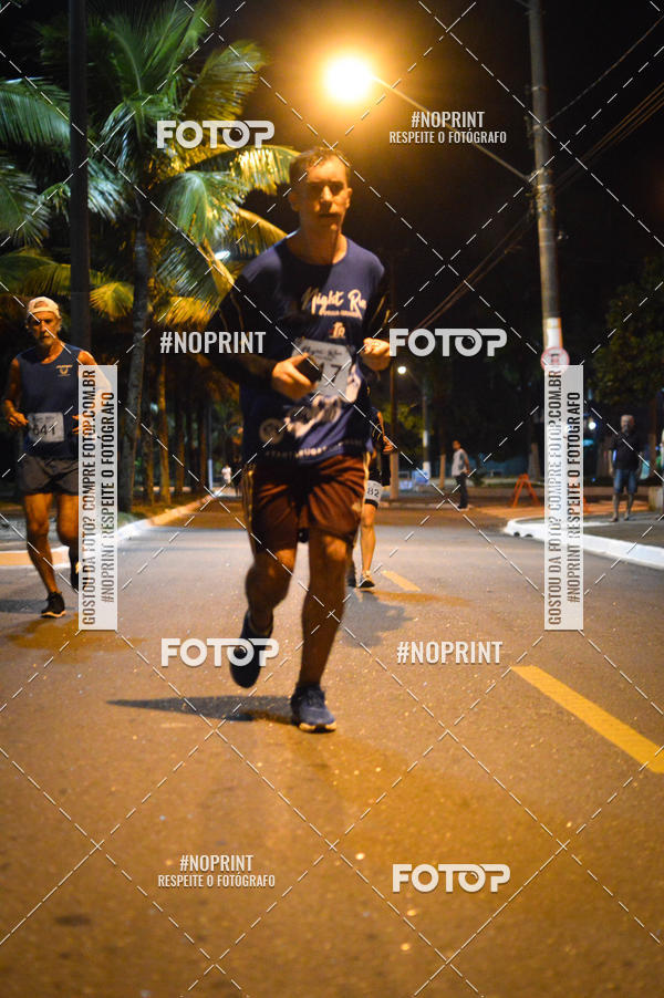 Buy your photos of the eventNight Run 5K 10K Praia Grande on Fotop