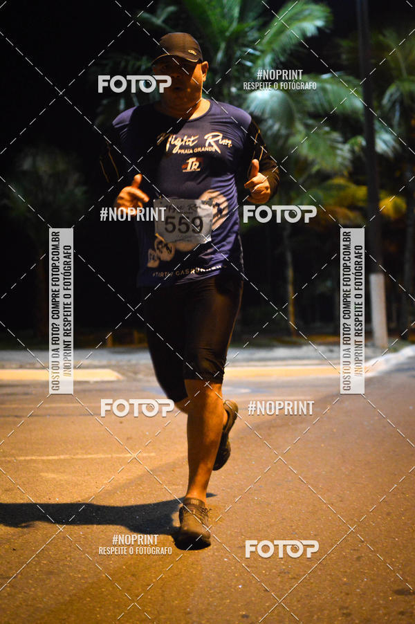 Buy your photos of the eventNight Run 5K 10K Praia Grande on Fotop