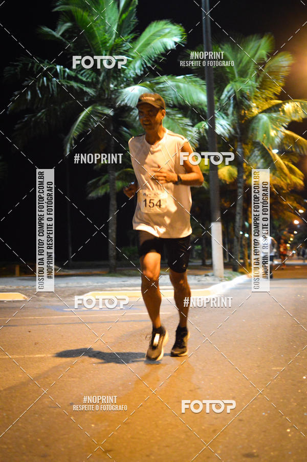 Buy your photos of the eventNight Run 5K 10K Praia Grande on Fotop