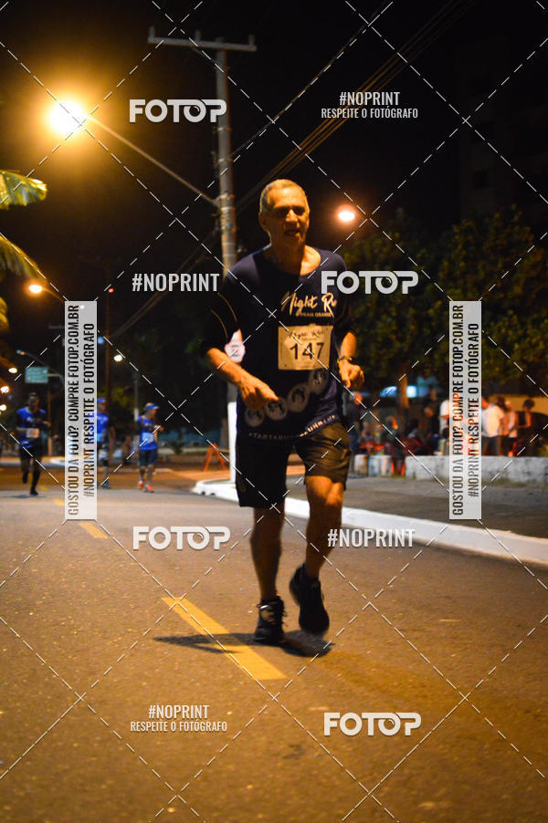 Buy your photos of the eventNight Run 5K 10K Praia Grande on Fotop