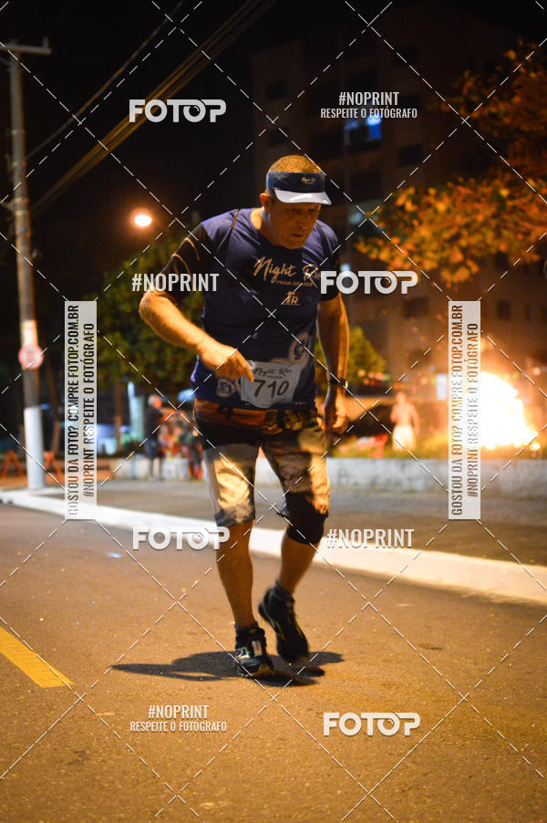 Buy your photos of the eventNight Run 5K 10K Praia Grande on Fotop