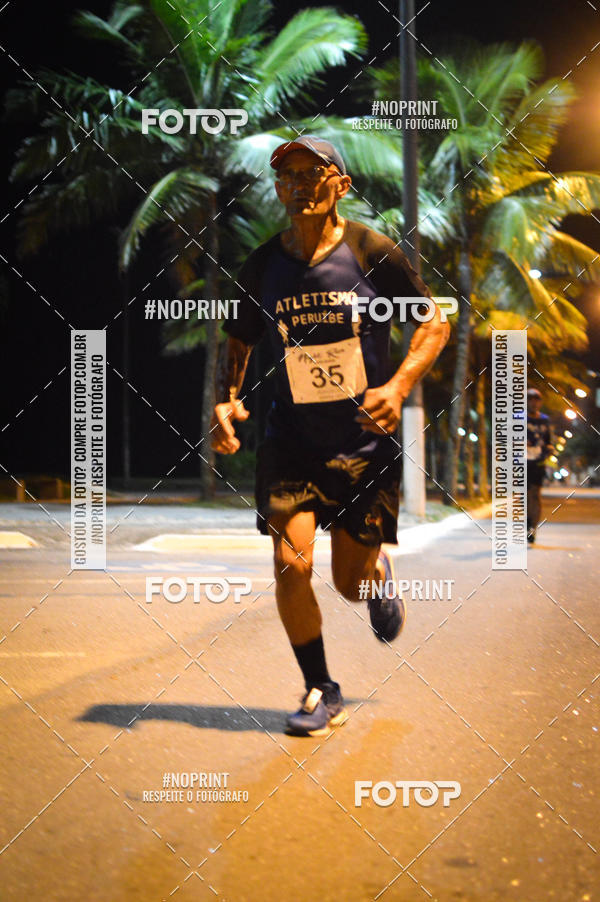 Buy your photos of the eventNight Run 5K 10K Praia Grande on Fotop