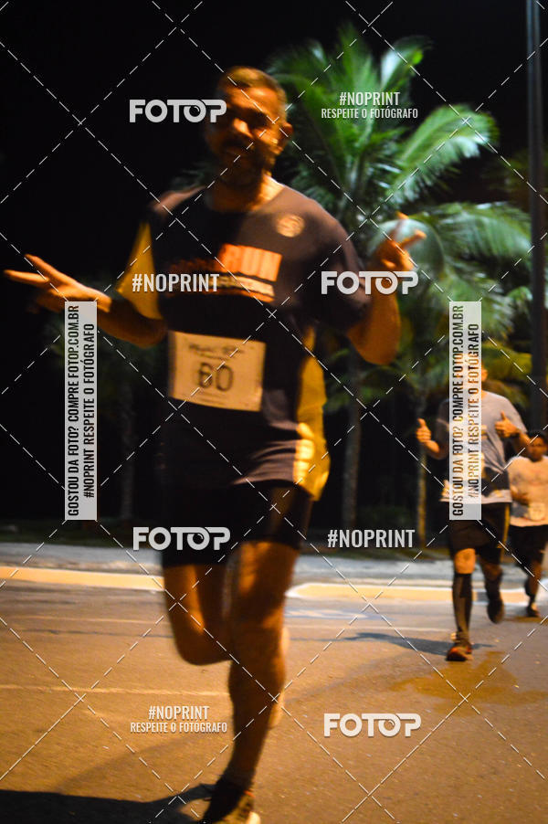 Buy your photos of the eventNight Run 5K 10K Praia Grande on Fotop