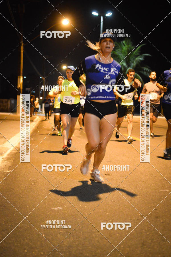 Buy your photos of the eventNight Run 5K 10K Praia Grande on Fotop