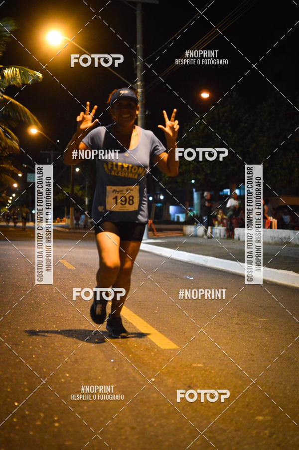 Buy your photos of the eventNight Run 5K 10K Praia Grande on Fotop