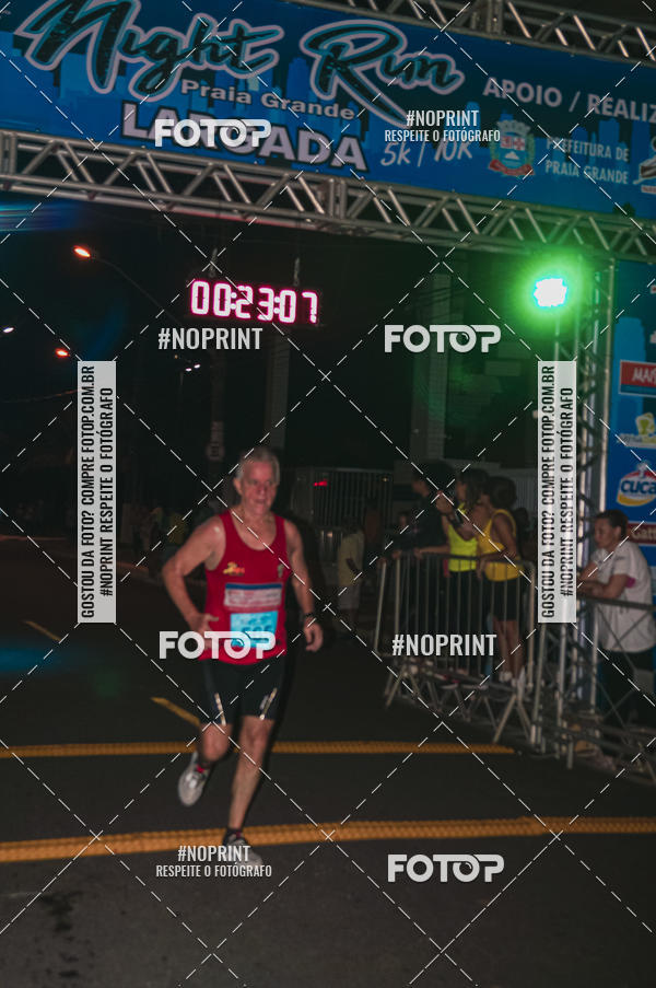 Buy your photos of the eventNight Run 5K 10K Praia Grande on Fotop