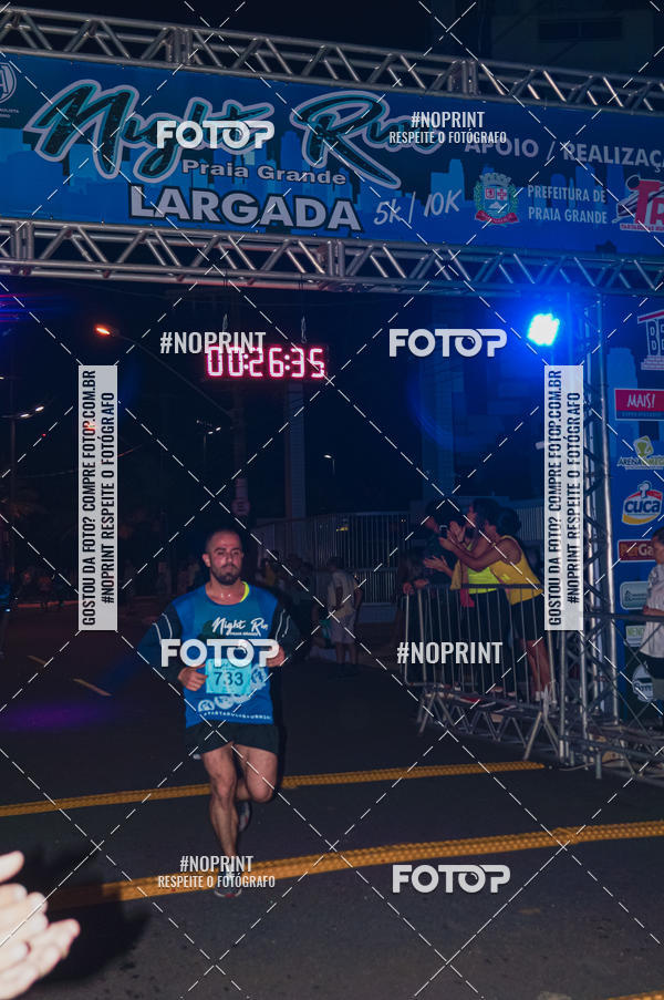 Buy your photos of the eventNight Run 5K 10K Praia Grande on Fotop