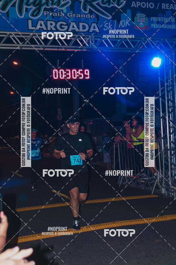 Buy your photos of the eventNight Run 5K 10K Praia Grande on Fotop